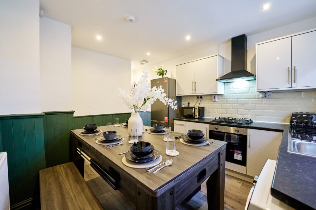 Dining area with modern table and chairs in a Coventry property